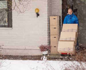 People moving house, man using the 2 wheel dolly